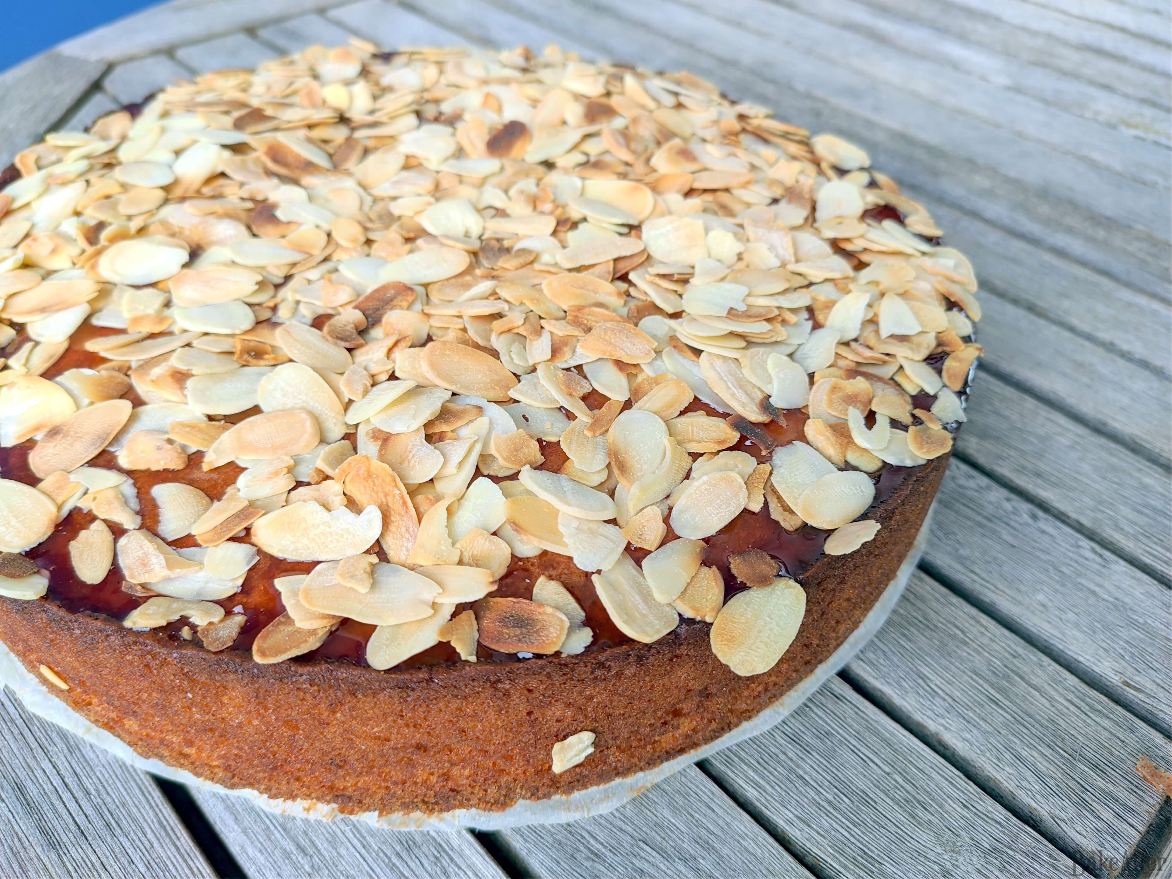 Fluffy Almond Cake with Sweet Jam and Crunchy Almonds · Bake After Recipe